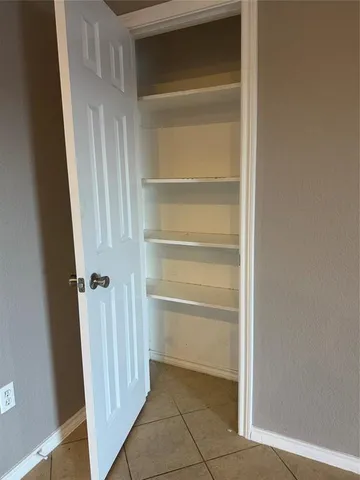 a view of a closet in a room