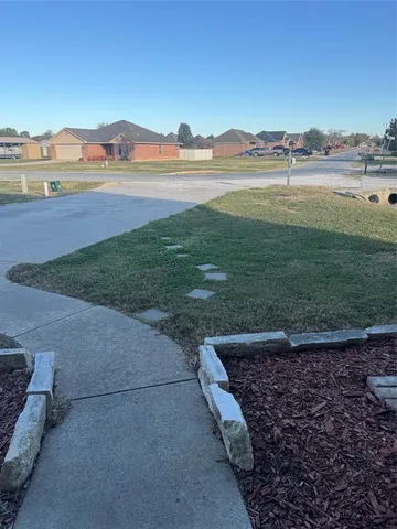 a view of a lake with mountain in the background