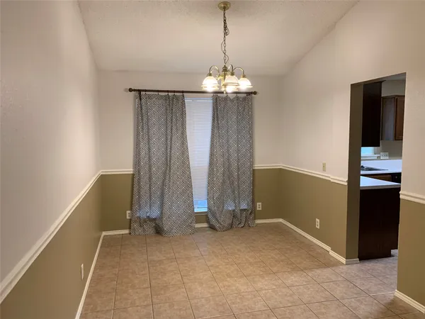 a view of a bedroom with windows