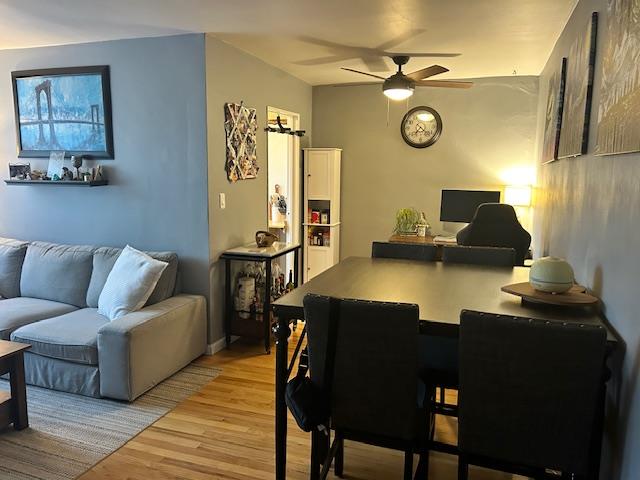 199-39 19th Avenue, Unit UPPR Queens, NY 11360 - Photo 6 of 16 Dining room with a ceiling fan and wood finished floors
