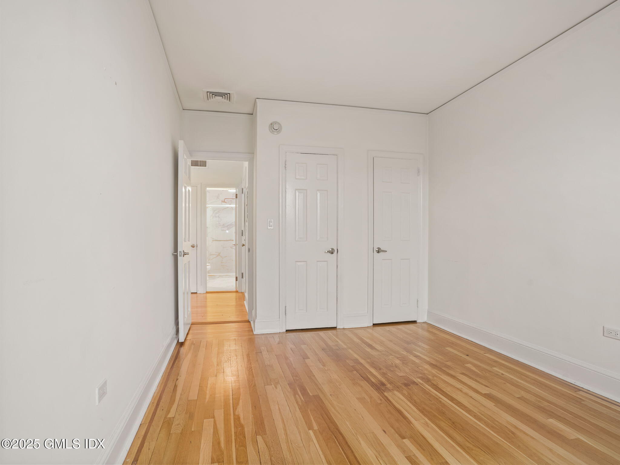 169 Greenwich Avenue, Unit FRONT Greenwich, CT 06830 - Photo 12 of 22 a view of a room with wooden floor