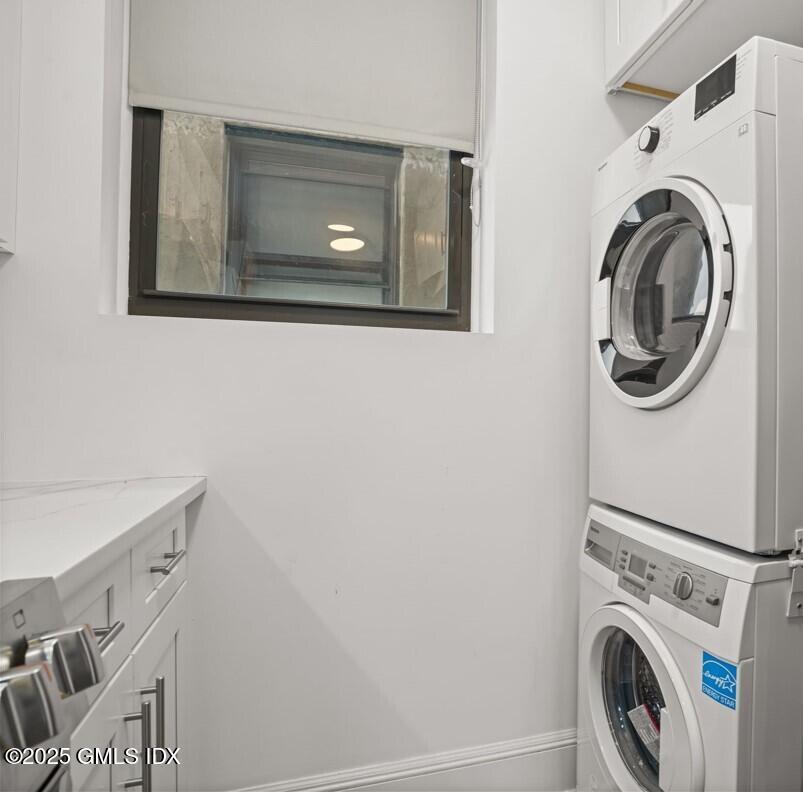 169 Greenwich Avenue, Unit FRONT Greenwich, CT 06830 - Photo 14 of 22 a utility room with dryer and washer