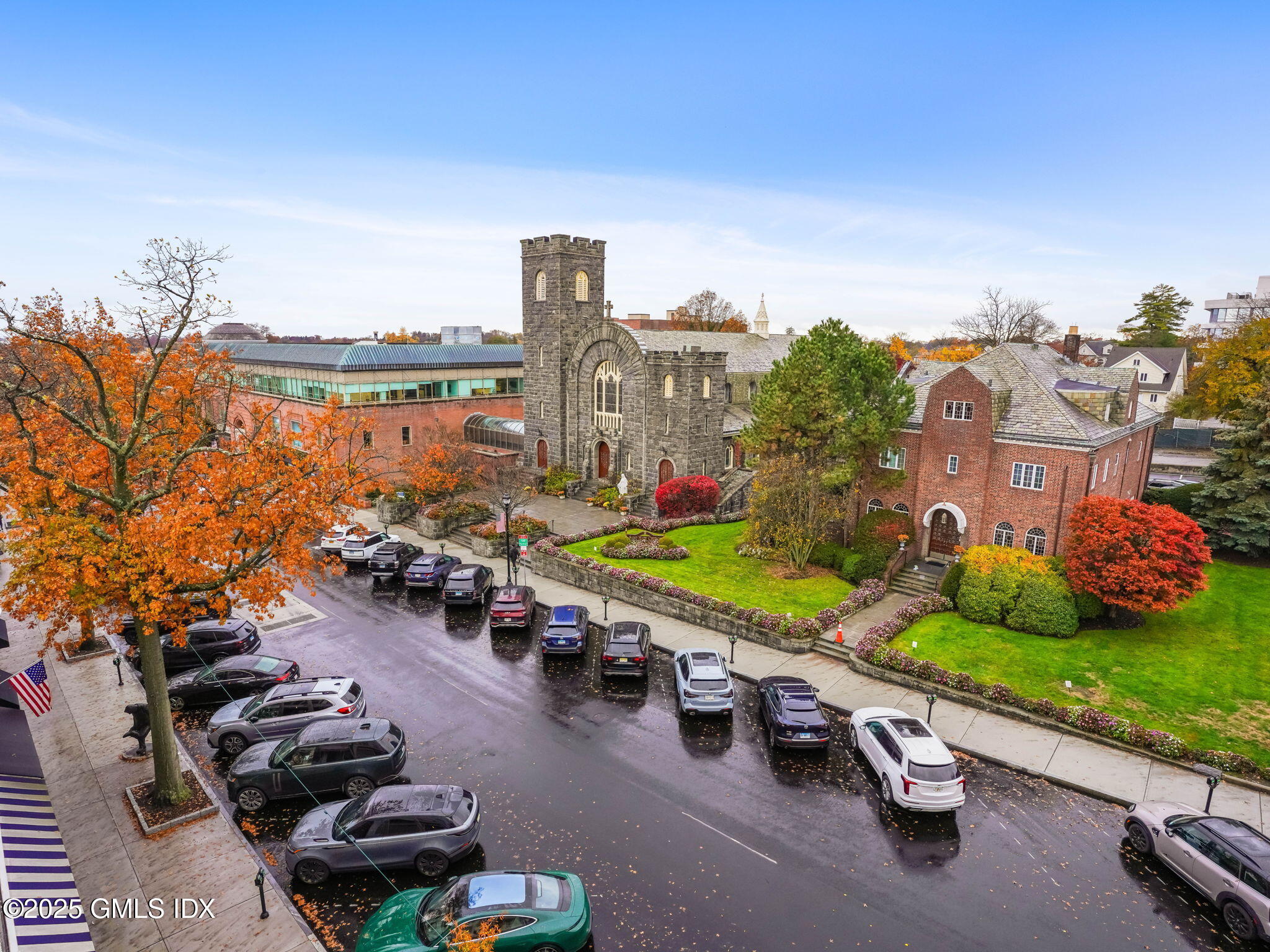 169 Greenwich Avenue, Unit FRONT Greenwich, CT 06830 - Photo 18 of 22 a view of a city with lawn chairs