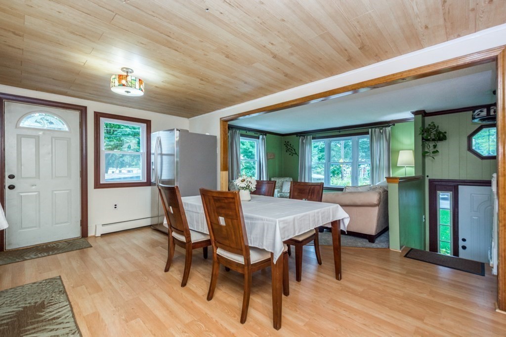 2 Lakeside Avenue Webster, MA 01570 - Photo 12 of 27 a view of a dining room with furniture window and wooden floor