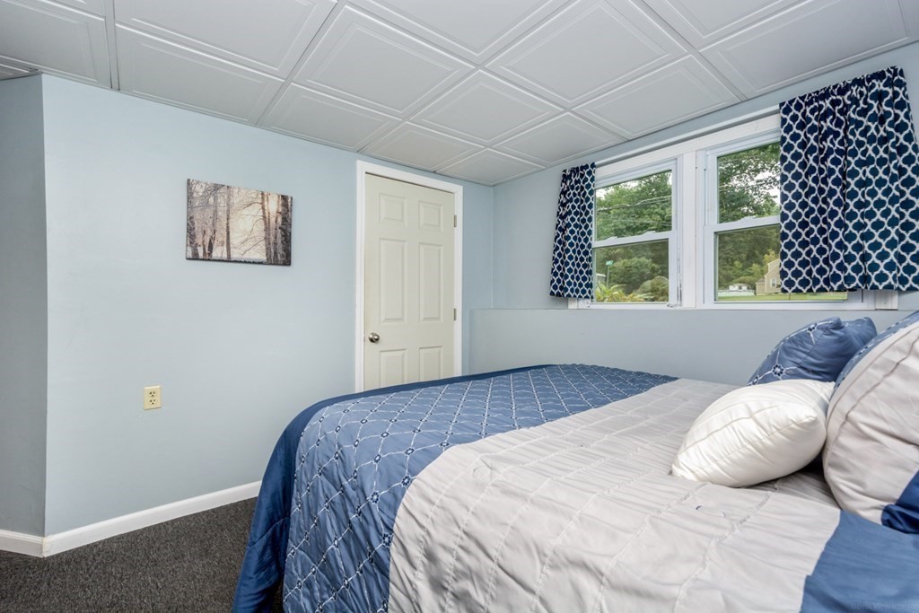 2 Lakeside Avenue Webster, MA 01570 - Photo 15 of 27 a bedroom with a bed and a window