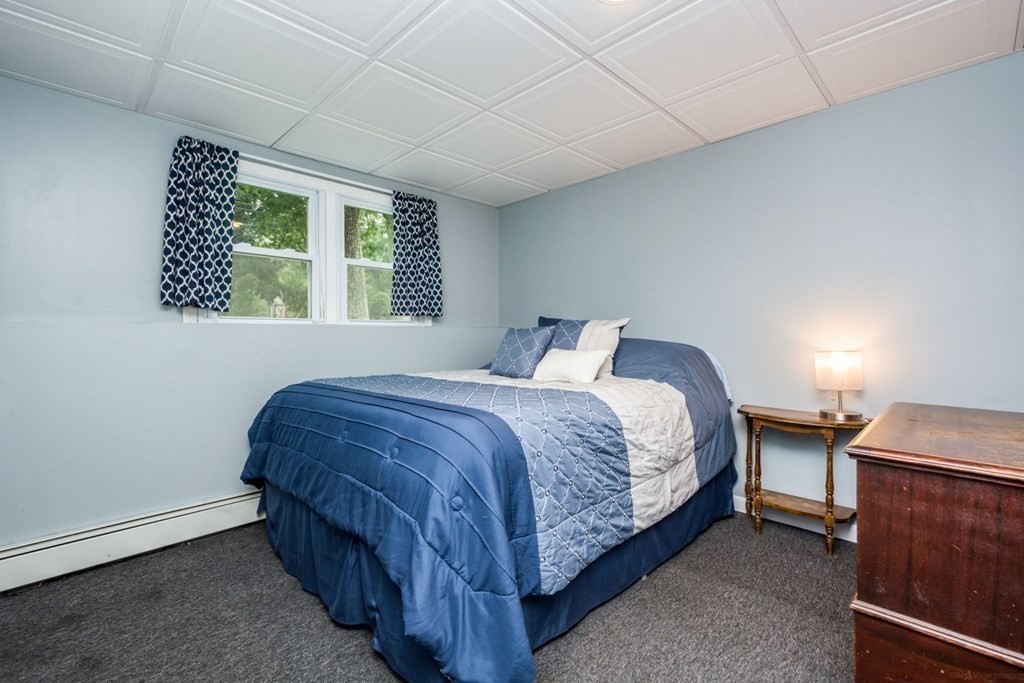 2 Lakeside Avenue Webster, MA 01570 - Photo 16 of 27 a bedroom with a bed and a window
