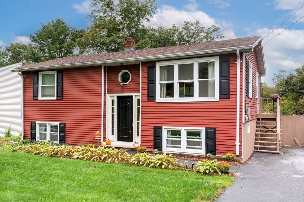 2 Lakeside Avenue Webster, MA 01570 - Photo 2 of 27 a front view of a house with a garden