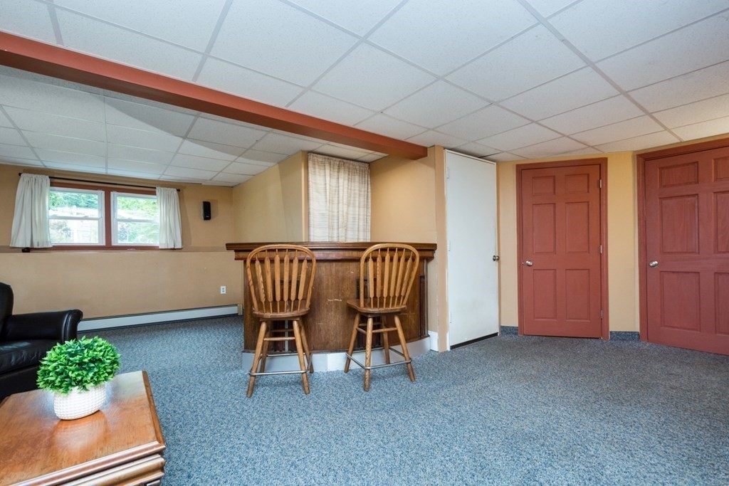2 Lakeside Avenue Webster, MA 01570 - Photo 22 of 27 a room with furniture and a table