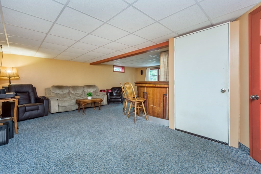 2 Lakeside Avenue Webster, MA 01570 - Photo 23 of 27 a living room with furniture and a window