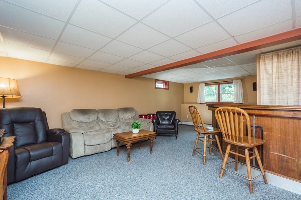 2 Lakeside Avenue Webster, MA 01570 - Photo 24 of 27 a living room with furniture and a window