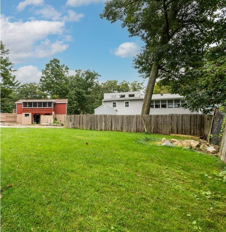 2 Lakeside Avenue Webster, MA 01570 - Photo 27 of 27 a view of a house with backyard and sitting area