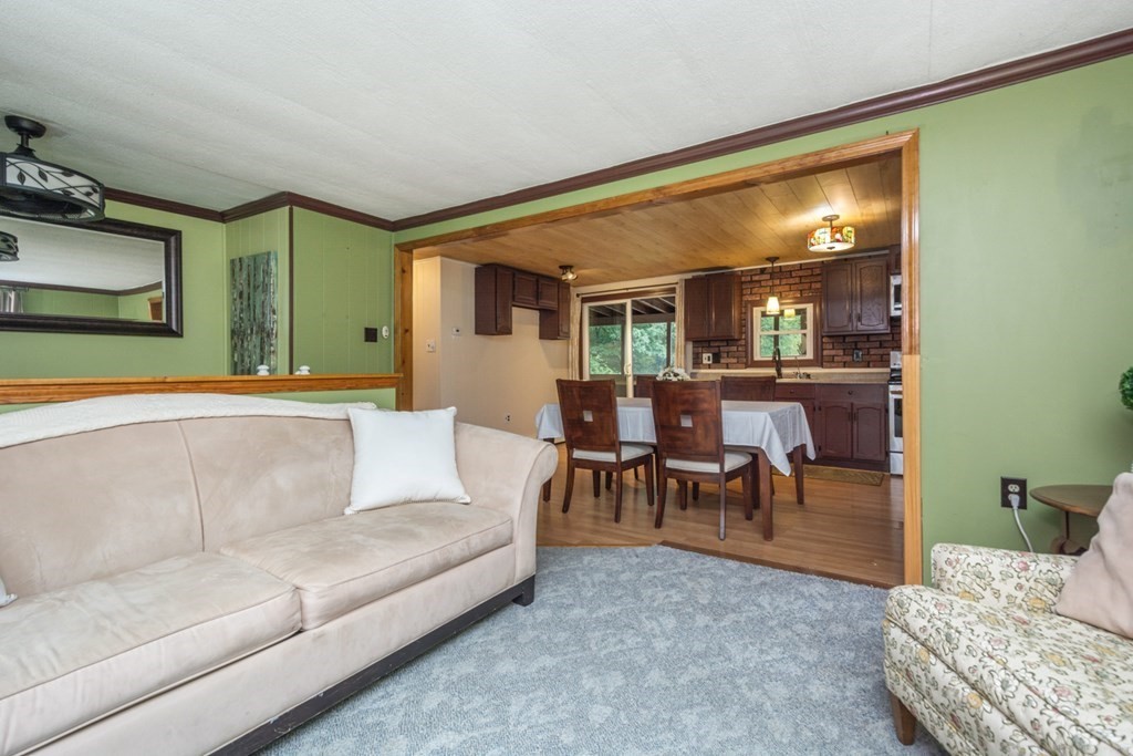 2 Lakeside Avenue Webster, MA 01570 - Photo 7 of 27 a living room with furniture and a large window