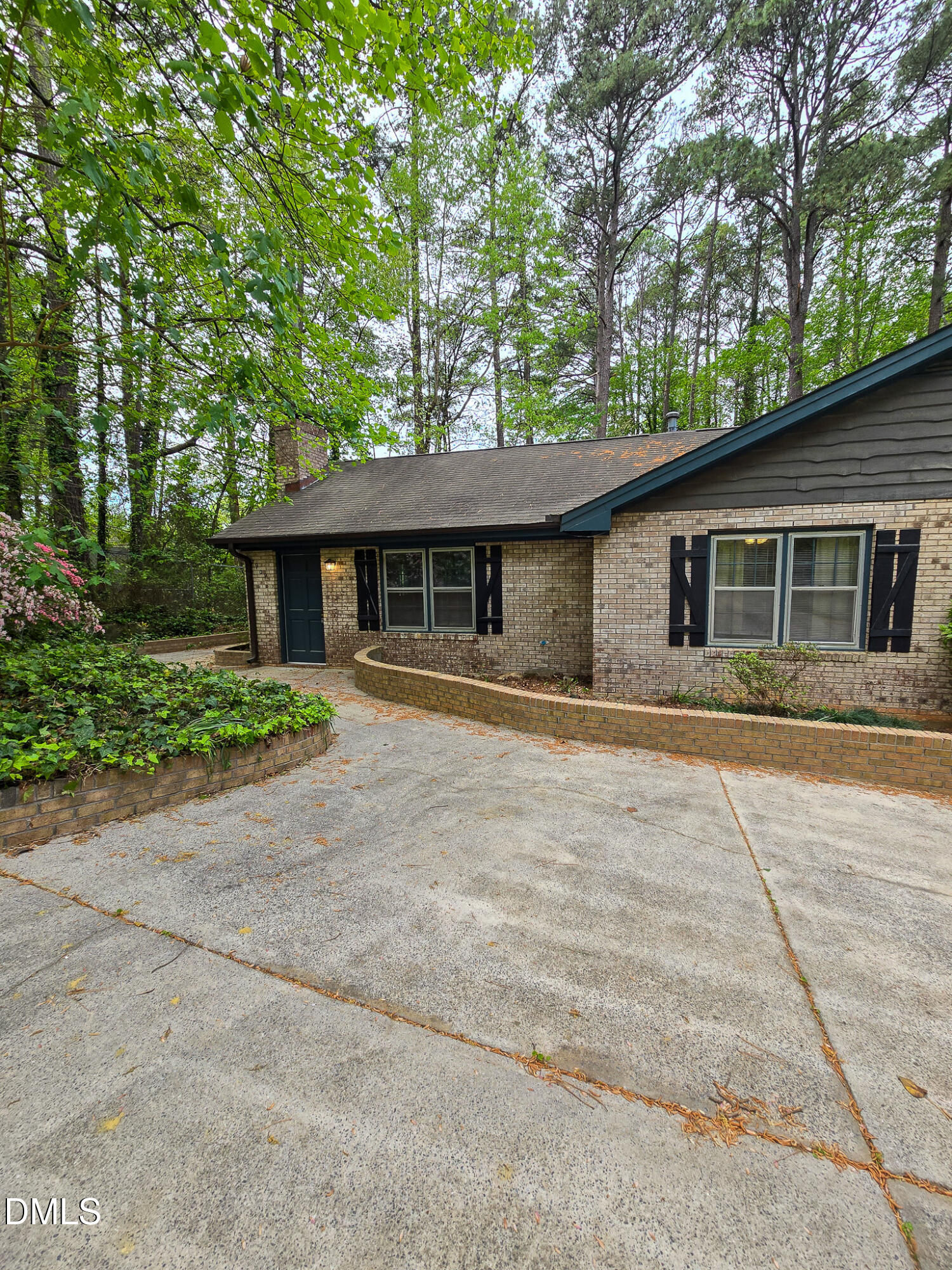 3909 Greenleaf Street Raleigh, NC 27606 - Photo 1 of 27 front view of a house with a patio