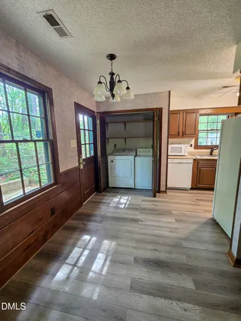 a room with a bed and window