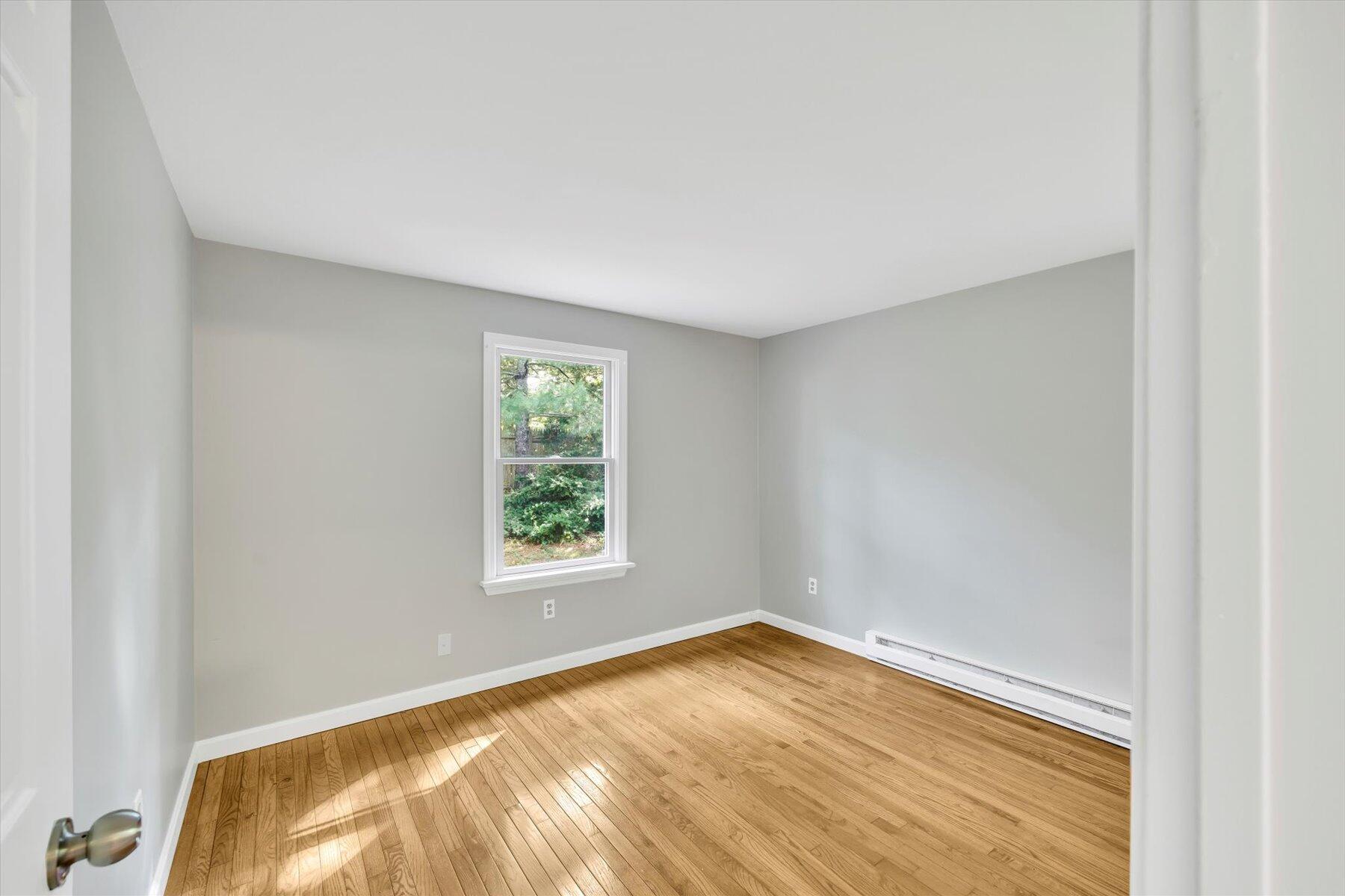 59 Oregon Road Mashpee, MA 02649 - Photo 16 of 34 an empty room with a window