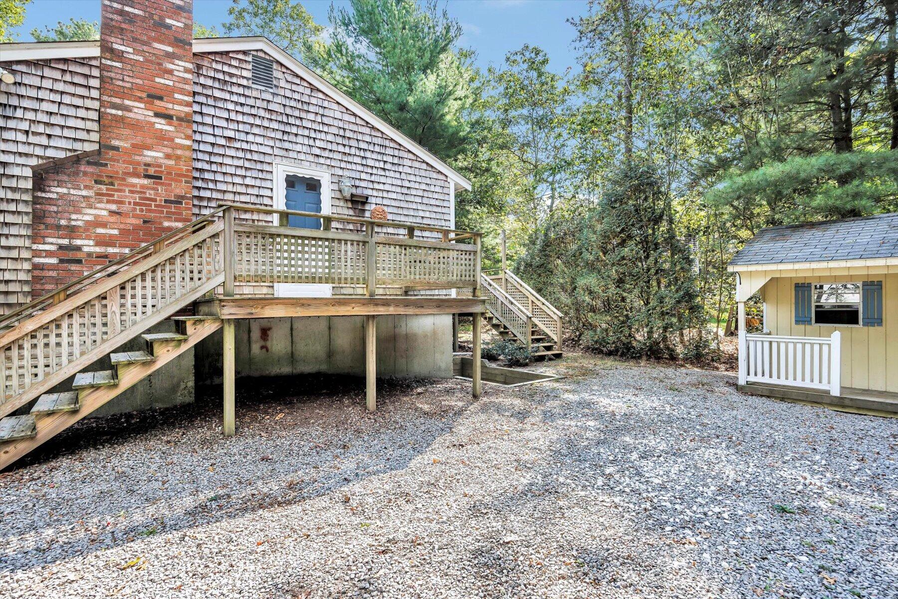 59 Oregon Road Mashpee, MA 02649 - Photo 3 of 34 a view of a house with a yard