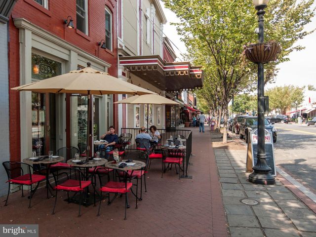 a view of a chairs and tables in the patio
