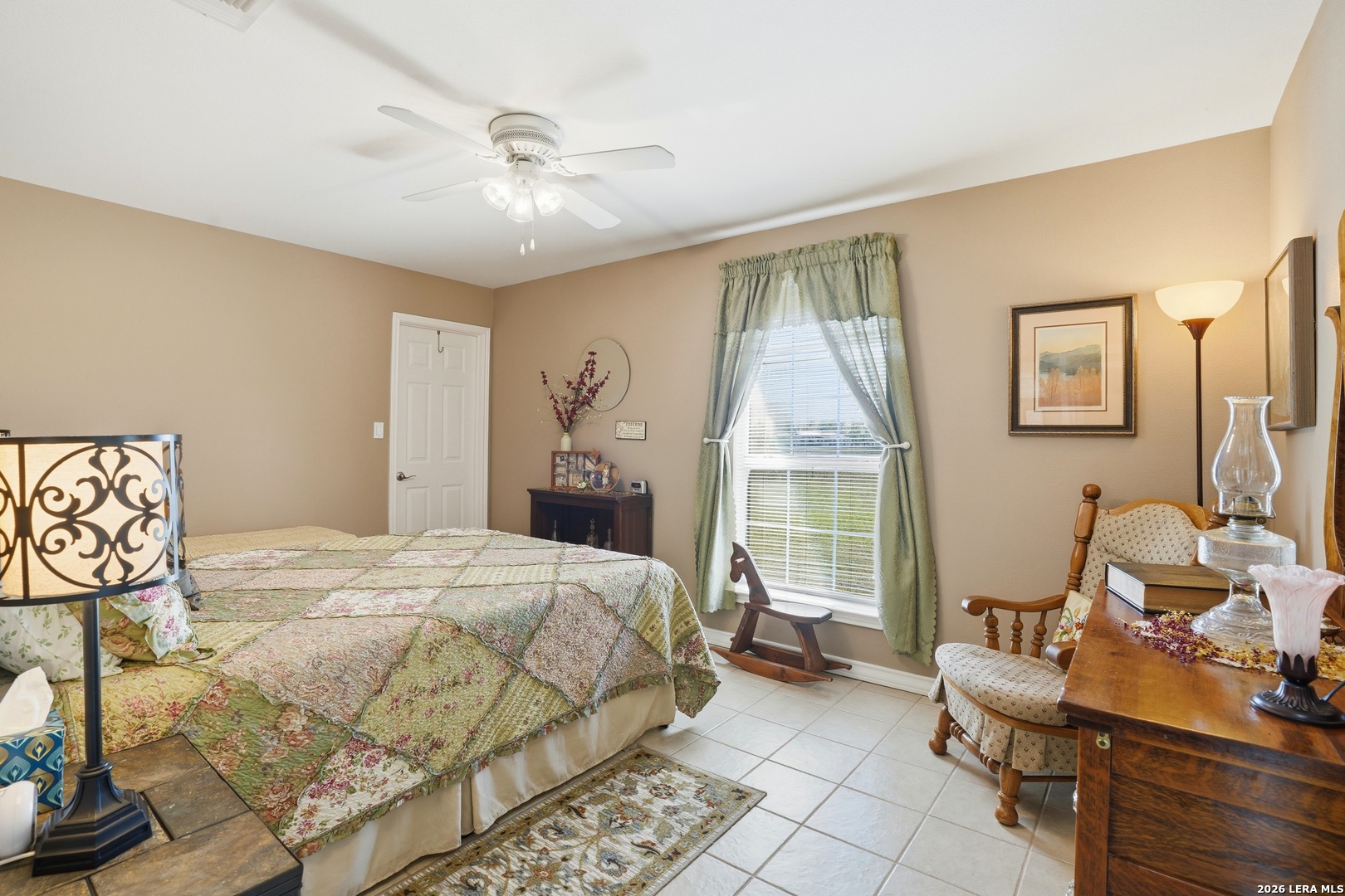 293 Woodrow Center Road Kingsbury, TX 78638 - Photo 14 of 50 a bedroom with a bed and wooden floor