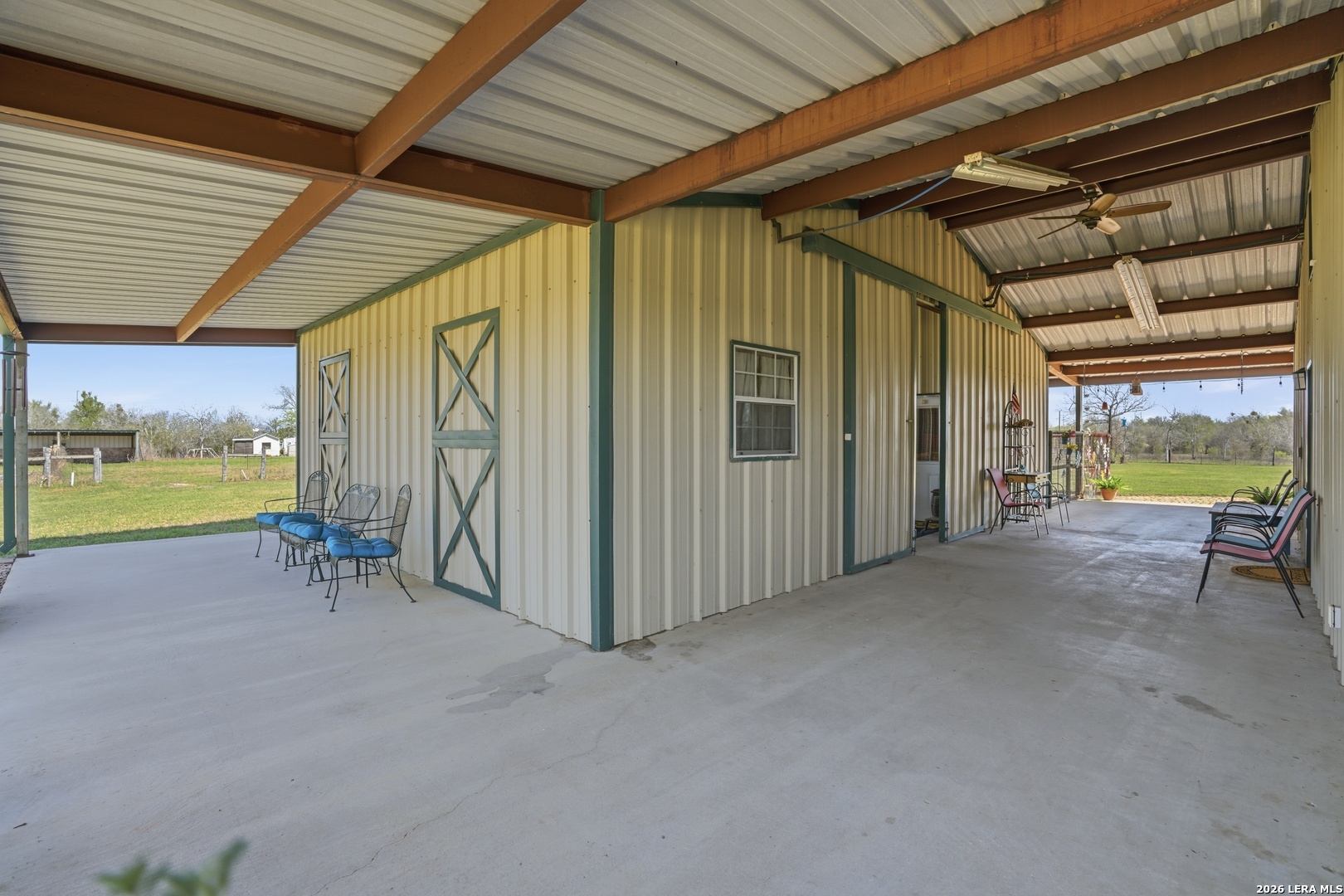 293 Woodrow Center Road Kingsbury, TX 78638 - Photo 26 of 50 a view of an outdoor space and deck