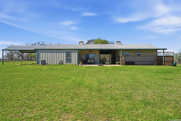 a front view of house with yard