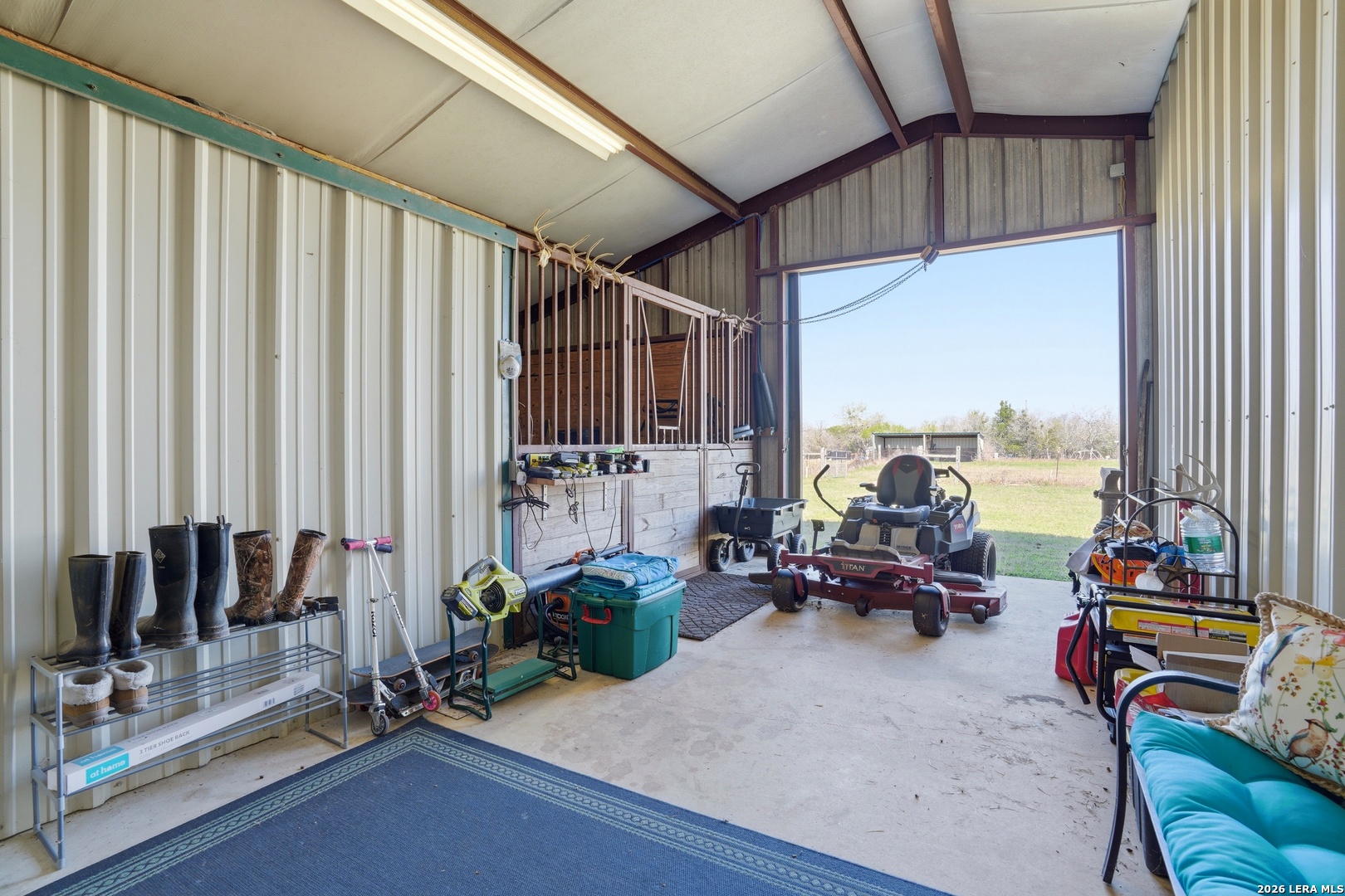 293 Woodrow Center Road Kingsbury, TX 78638 - Photo 33 of 50 a living room with furniture and floor to ceiling window