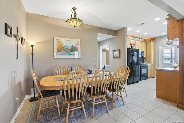 a view of a dining room with furniture