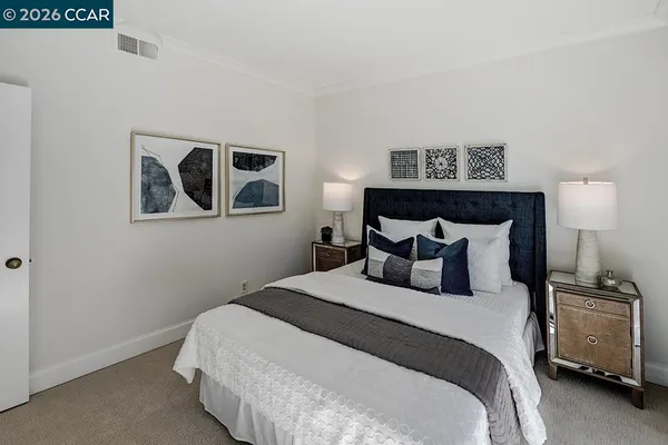 a room with a sink cabinets and utility
