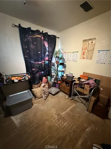 a view of an empty room with stairs