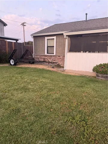 a view of a porch with furniture
