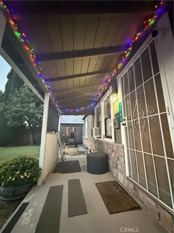 a view of storage and utility room with racks on the wall