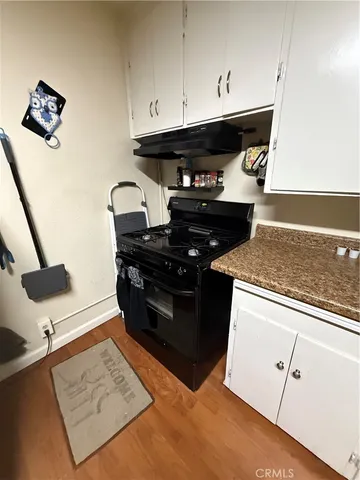 a white refrigerator freezer sitting inside of a kitchen