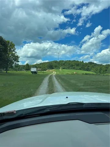 a view of a lake from a yard