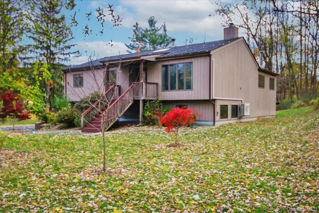 a front view of house with small garden