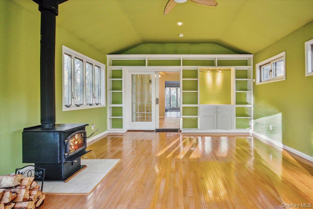 102 Old Post Road Marlboro, NY 12542 - Photo 15 of 46 a view of an empty room with a window and wooden floor