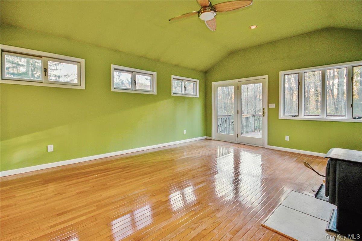 102 Old Post Road Marlboro, NY 12542 - Photo 16 of 46 a view of empty room with windows and ceiling fan