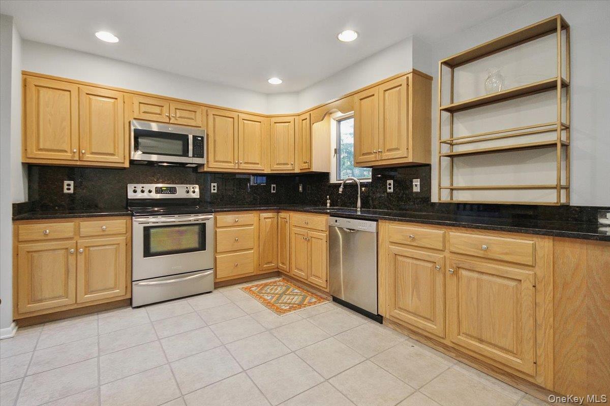 102 Old Post Road Marlboro, NY 12542 - Photo 20 of 46 a kitchen with white cabinets appliances and a sink