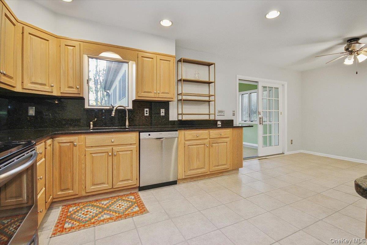 102 Old Post Road Marlboro, NY 12542 - Photo 21 of 46 a kitchen with granite countertop a sink and cabinets