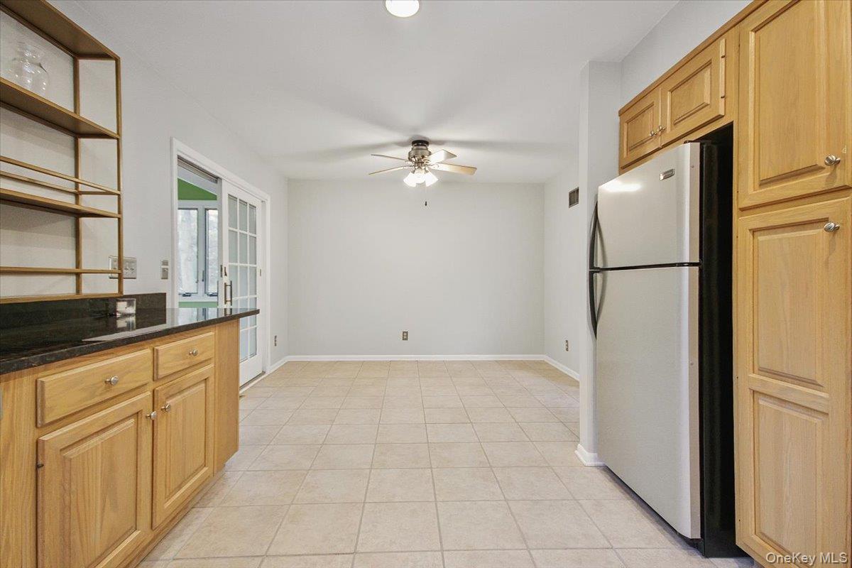 102 Old Post Road Marlboro, NY 12542 - Photo 23 of 46 a kitchen with granite countertop a refrigerator a sink and dishwasher