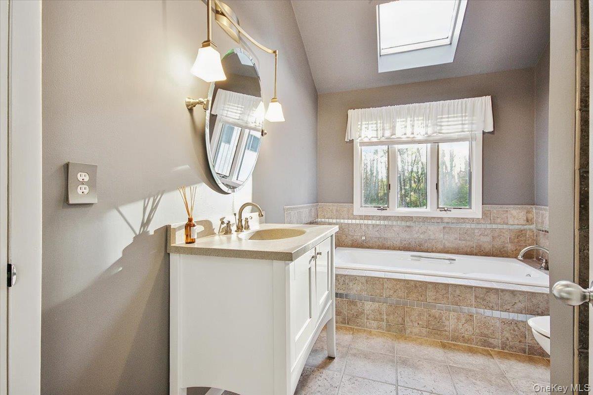 102 Old Post Road Marlboro, NY 12542 - Photo 24 of 46 a bath room with a sink and a mirror