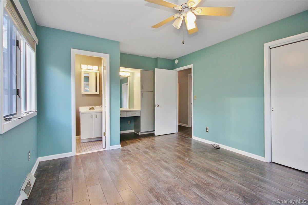 102 Old Post Road Marlboro, NY 12542 - Photo 28 of 46 wooden floor in an empty room with a window