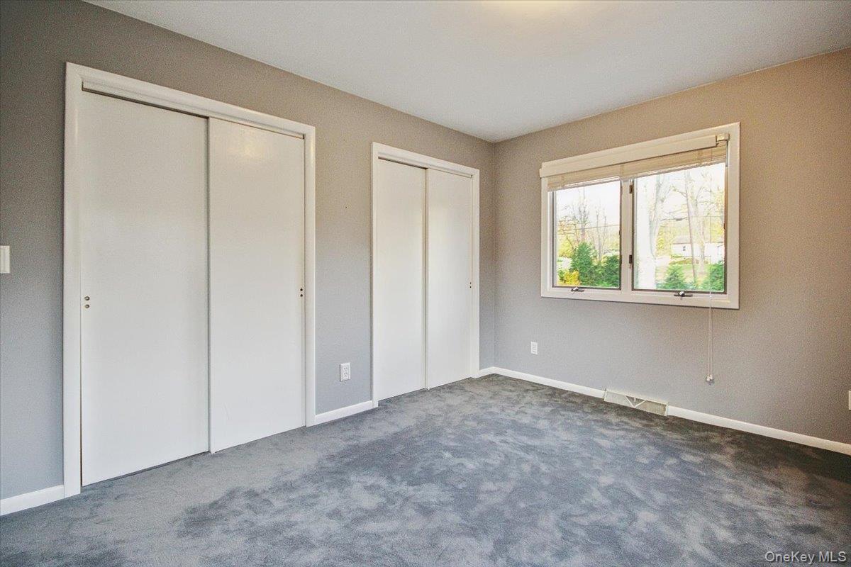 102 Old Post Road Marlboro, NY 12542 - Photo 31 of 46 an empty room with windows and closet