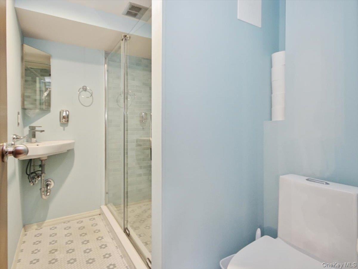 102 Old Post Road Marlboro, NY 12542 - Photo 37 of 46 a bathroom with a sink a toilet and shower