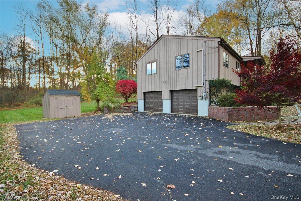 102 Old Post Road Marlboro, NY 12542 - Photo 45 of 46 a view of a house with a yard and garage