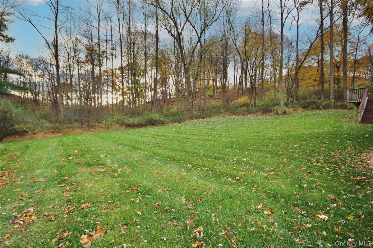 102 Old Post Road Marlboro, NY 12542 - Photo 7 of 46 a backyard of a house with lots of green space and fountain
