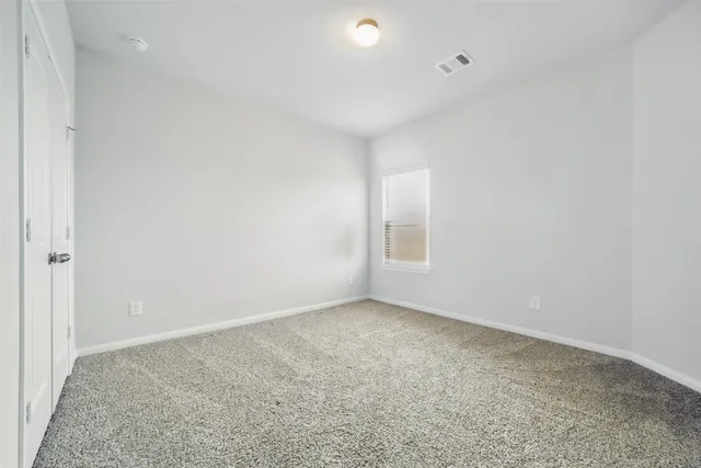 an empty room with a natural light