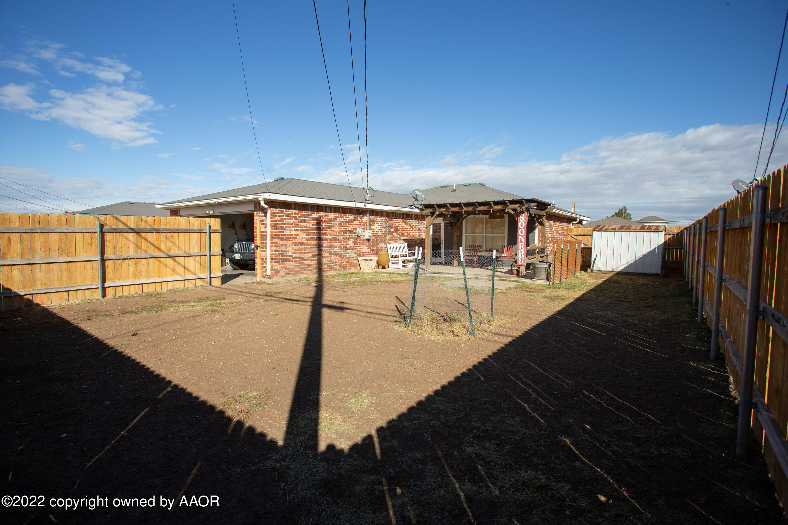 1121 Rushmore Drive Amarillo, TX 79110 - Photo 19 of 22 Backyard Area