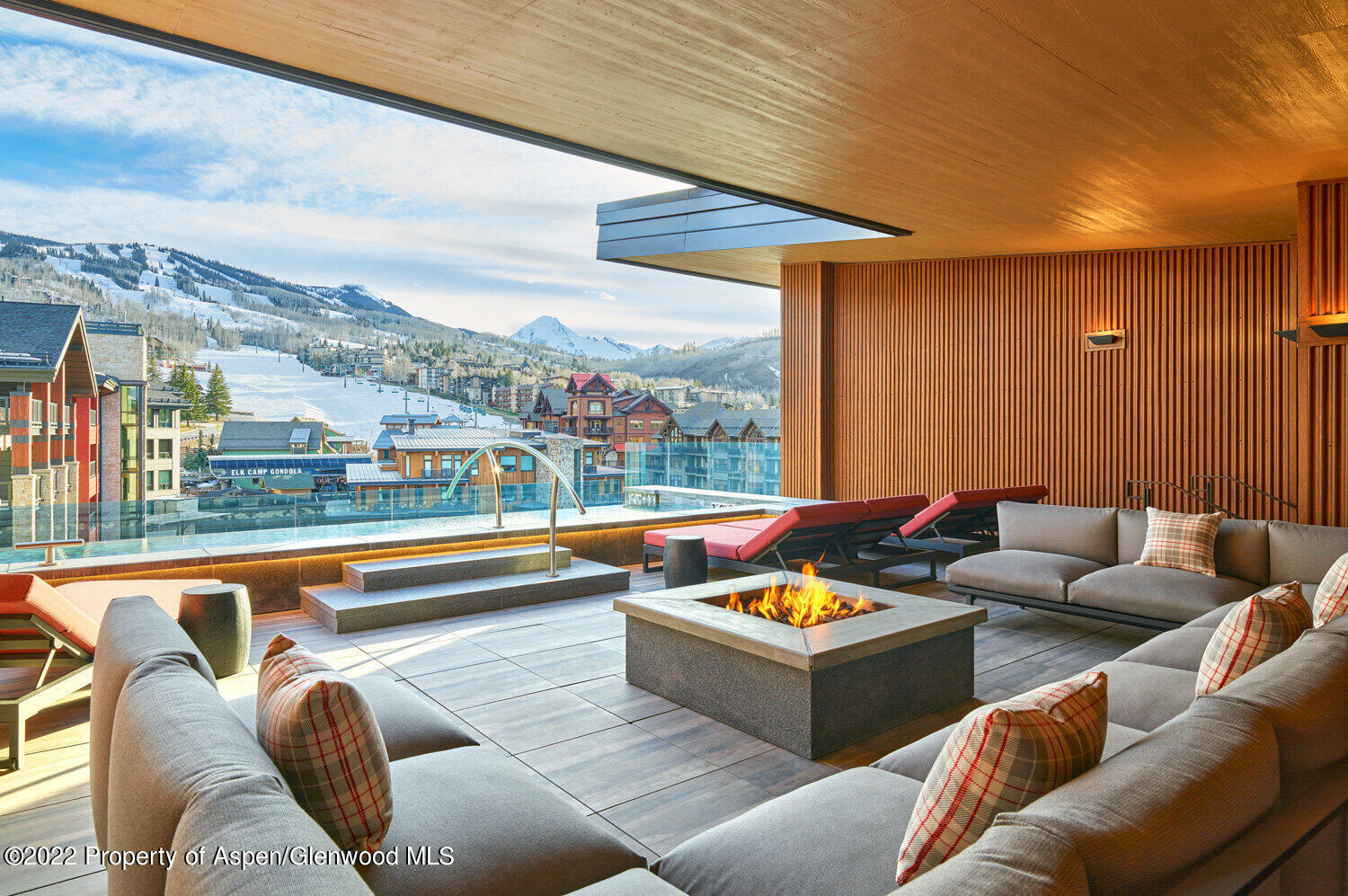 77 Wood Road, Unit 50702 Snowmass Village, CO 81615 - Photo 7 of 7 a outdoor living space with furniture and city view