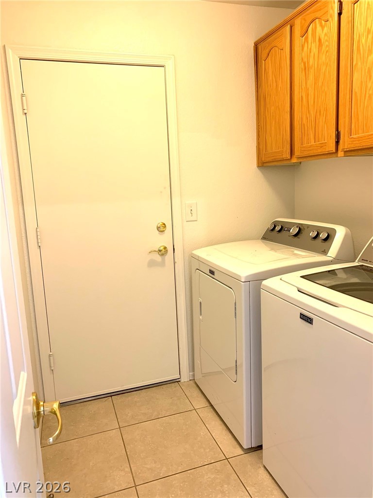 3821 Bombastic Court Las Vegas, NV 89147 - Photo 11 of 36 This functional space features a dedicated area for laundry with convenient storage.