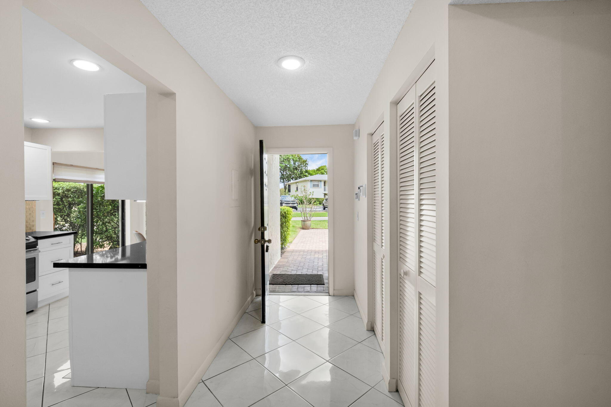 12 Westgate Lane, Unit C Boynton Beach, FL 33436 - Photo 3 of 54 a view of entryway with window