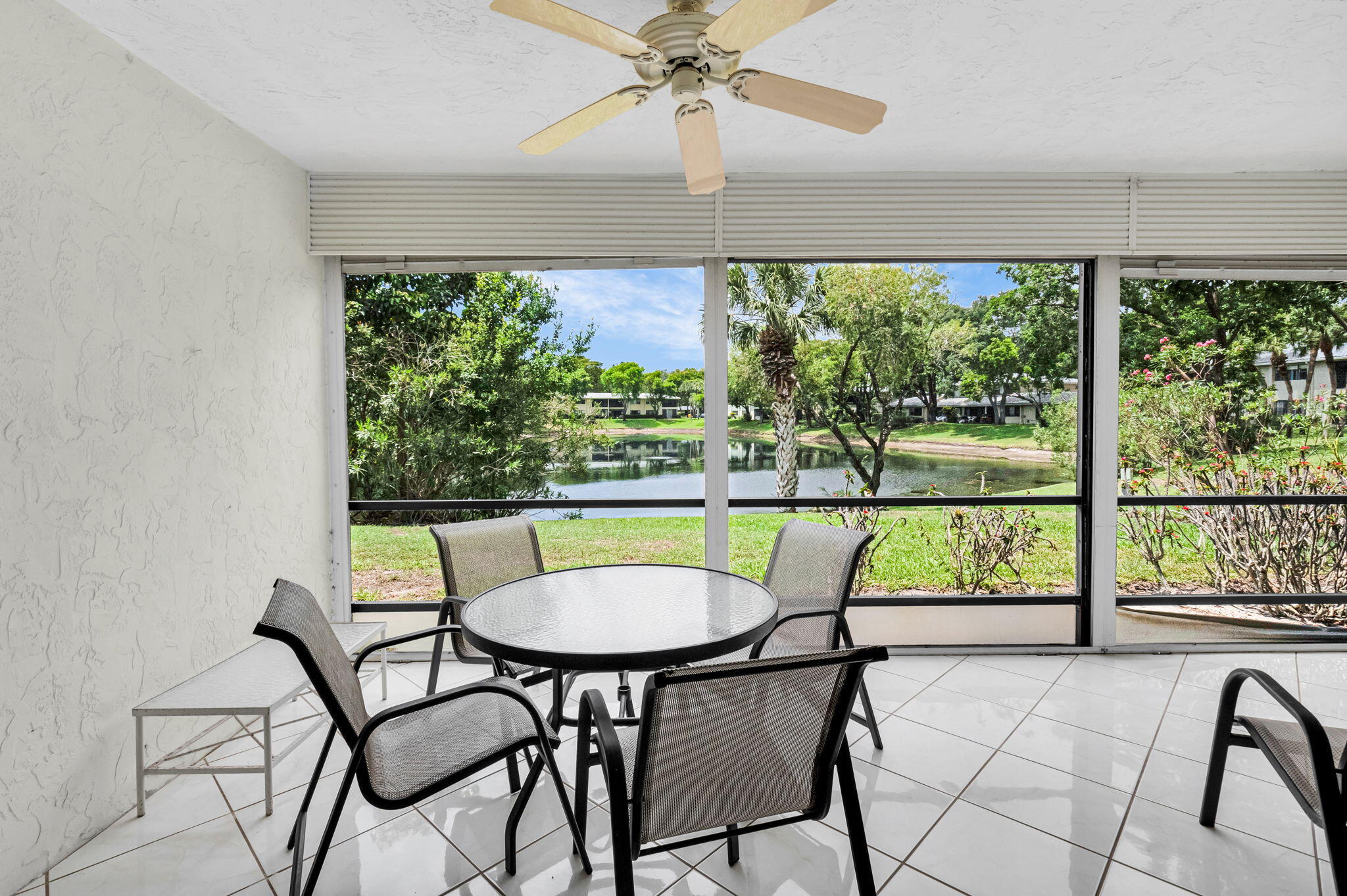 12 Westgate Lane, Unit C Boynton Beach, FL 33436 - Photo 31 of 54 a view of a dining room with furniture window and outside view